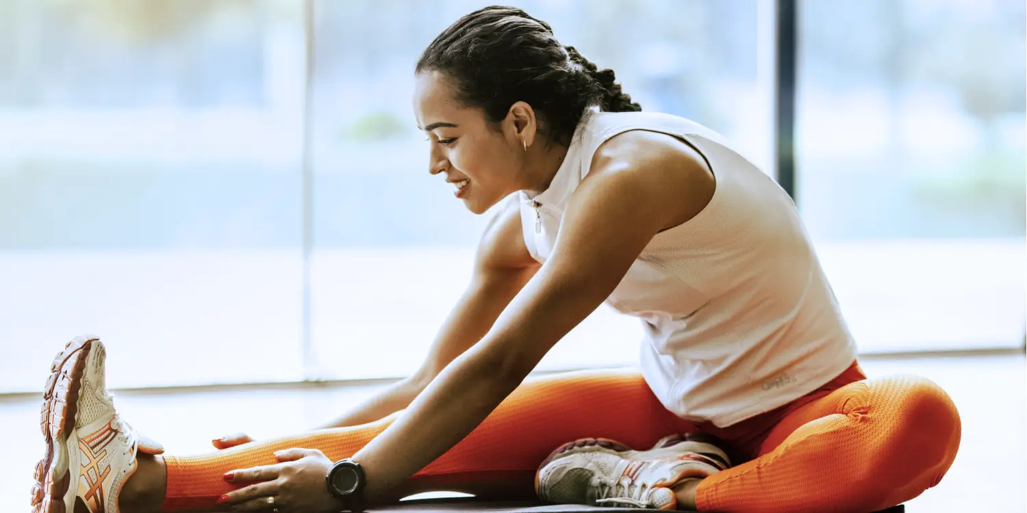 dexa vs seca body composition scan kansas city blog woman stretching before kansas city fitness testing